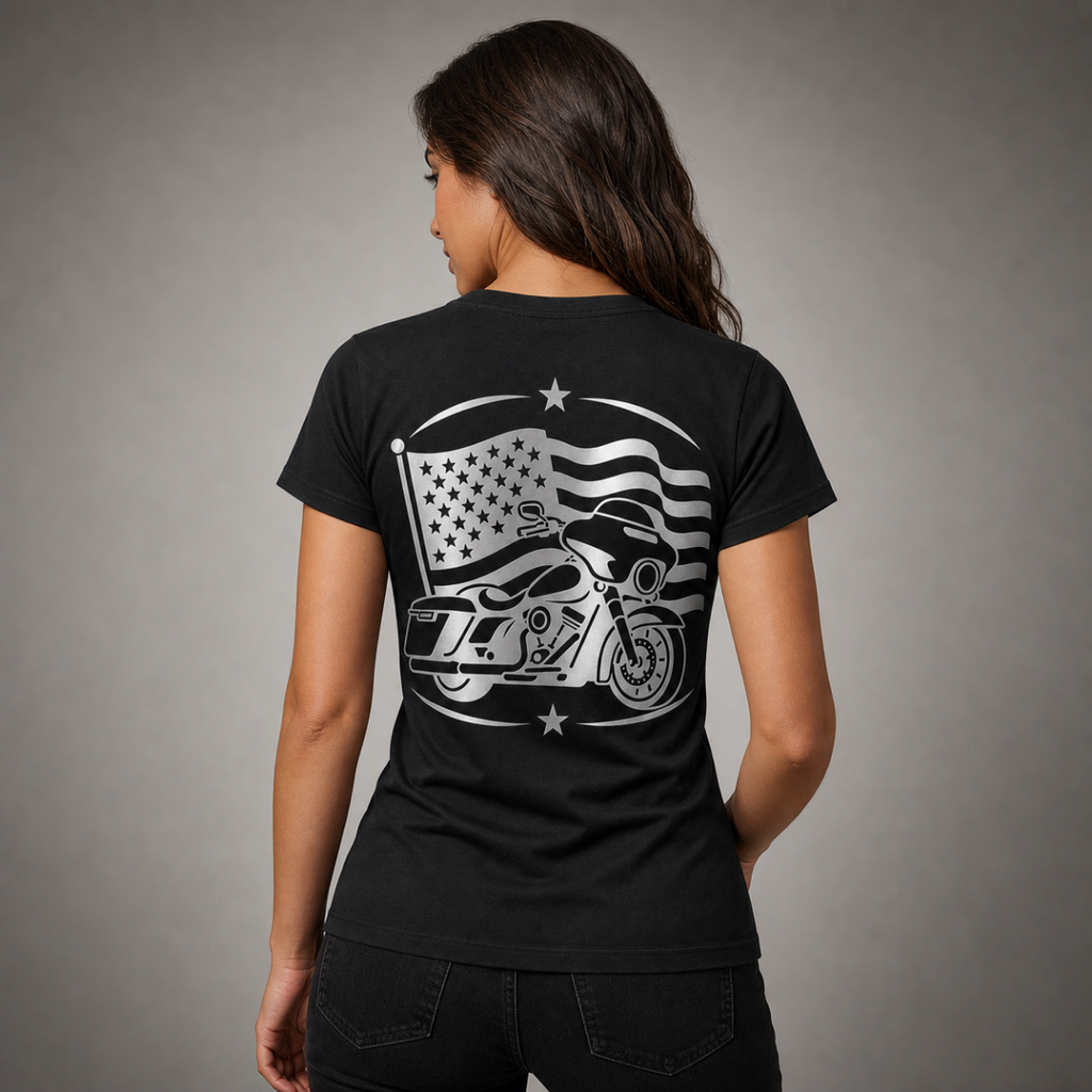 Street Beauty reflective women's motorcycle V-neck tee - back view showing rider on touring bagger with waving American flag reflective vinyl design