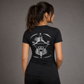 Road Queen reflective women's motorcycle V-neck tee - back view showing front-facing woman rider on touring bagger with star frame reflective vinyl design