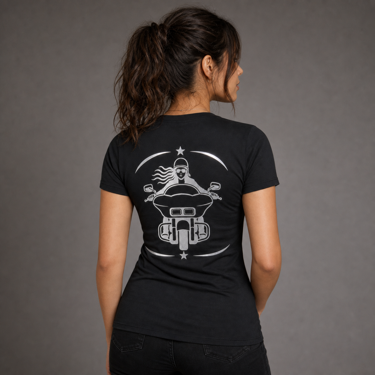 Road Queen reflective women's motorcycle V-neck tee - back view showing front-facing woman rider on touring bagger with star frame reflective vinyl design