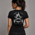 Ride Beyond reflective women's V-neck tee - back view showing woman rider on Can-Am Ryker spyder in crescent star frame reflective vinyl design