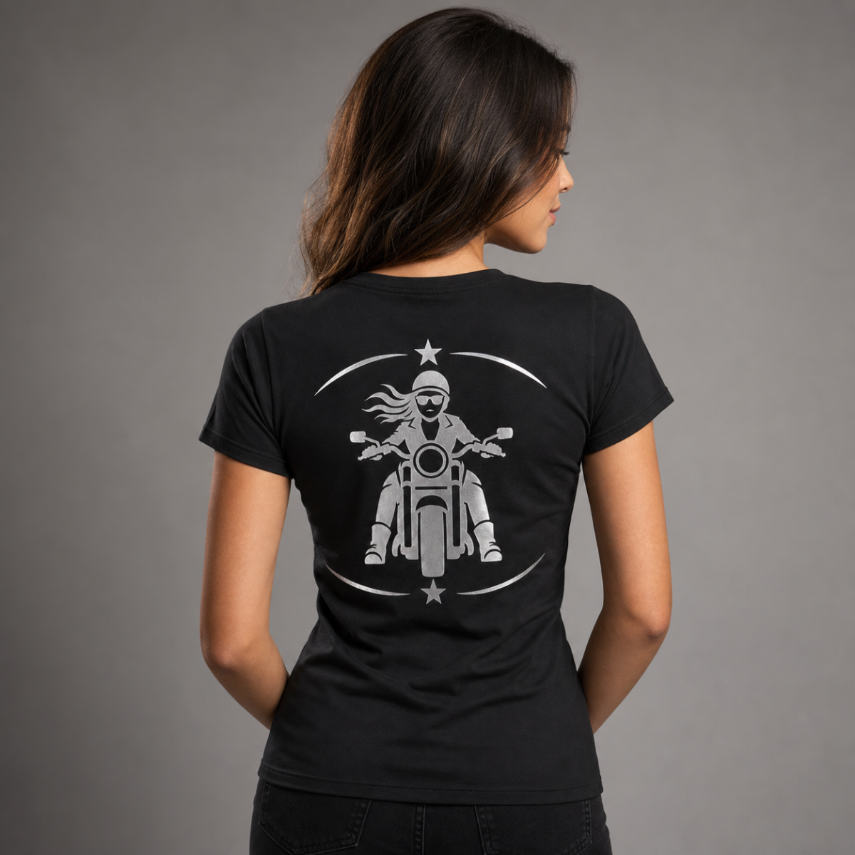 Rebel Spirit reflective women's motorcycle V-neck tee - back view showing front-facing woman rider with star and crescent frame reflective vinyl design